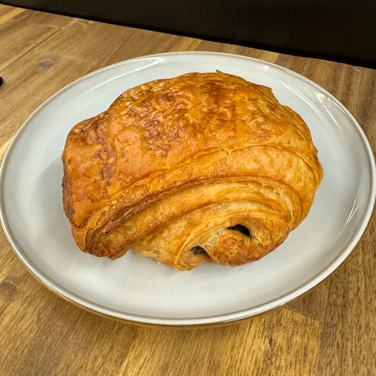 A delectable pain au chocolat generously filled with rich Cacao Barry chocolate.